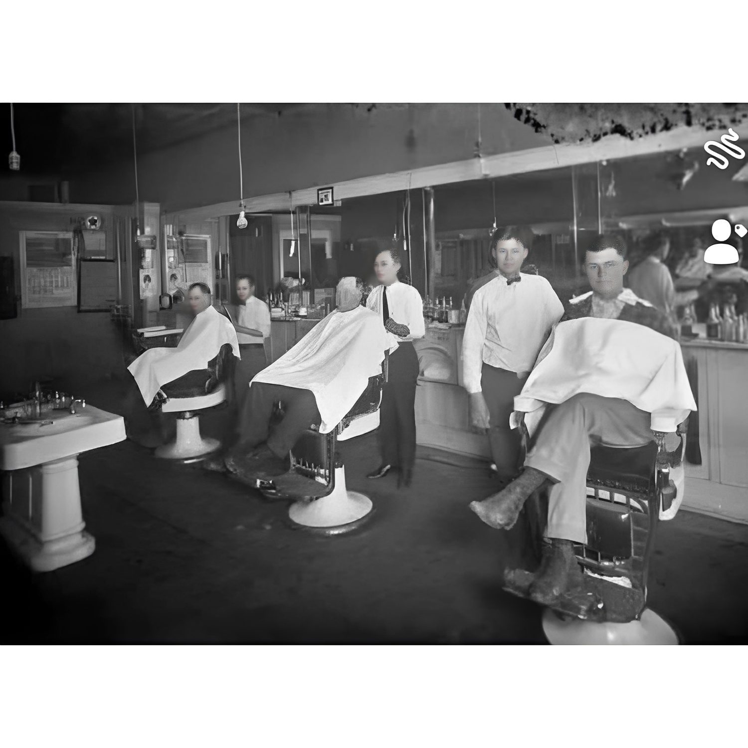 Barbershop scene with barbers and clients.