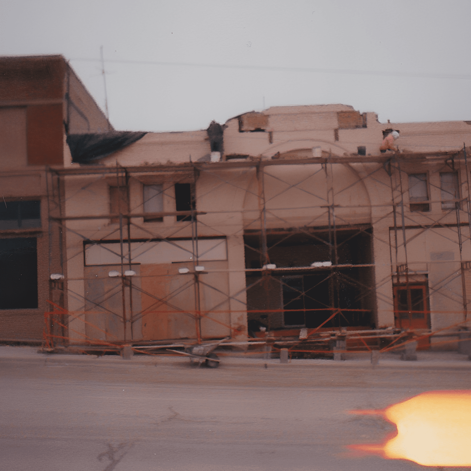 Building under construction with scaffolding.